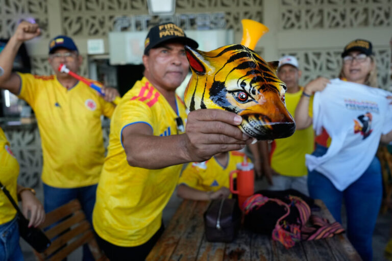 Supporters of presidential candidate Abelardo de la Espriella of the Defenders of the Motherland movement celebrate election results in Barranquilla, Colombia, Sunday, May 31, 2026. (AP Photo/Fernando Vergara)