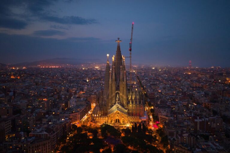 Antoni Gaudí's Basilica of the Sagrada Familia stands at dusk in Barcelona, Spain, Saturday, May 30, 2026, ahead of Pope Leo XIV's visit to Barcelona in June. (AP Photo/Emilio Morenatti)