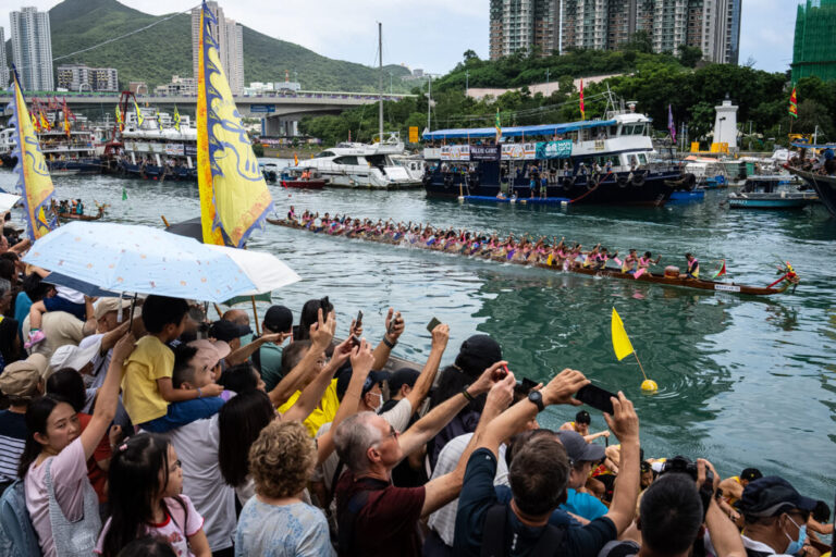 Competitors take part in the Aberdeen Dragon Boat Race to celebrate the Dragon Boat Festival in Hong Kong, Friday, June 19, 2026. (AP Photo/Chan Long Hei)