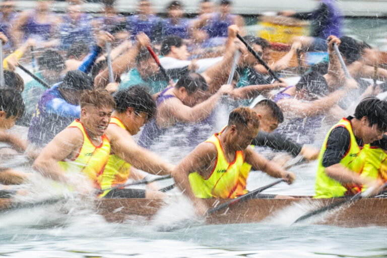 Competitors take part in the Aberdeen Dragon Boat Race to celebrate the Dragon Boat Festival in Hong Kong, Friday, June 19, 2026. (AP Photo/Chan Long Hei)