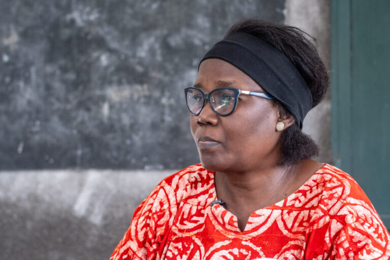 Head of an association of Congolese midwives, Annie Tshiamala, recounts her encounters with many women desperate to have sons in Kinshasa, Congo, Monday, April 6, 2026. (AP Photo/Samy Ntumba Shambuyi)