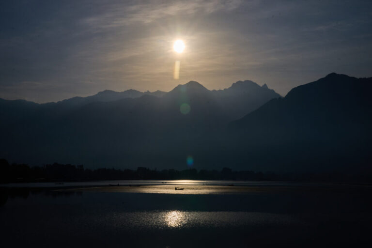 A Kashmiri fisher rows his boat at dawn on Dal Lake on the outskirts of Srinagar, Indian controlled Kashmir, Monday, May 4, 2026. (AP Photo/Dar Yasin)