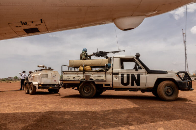 UN peacekeepers stand guard of a UN flight refuelling on the tarmac of the Birao Airport in Central African Republic, Wednesday, March 25, 2026. (AP Photo/Caitlin Kelly)