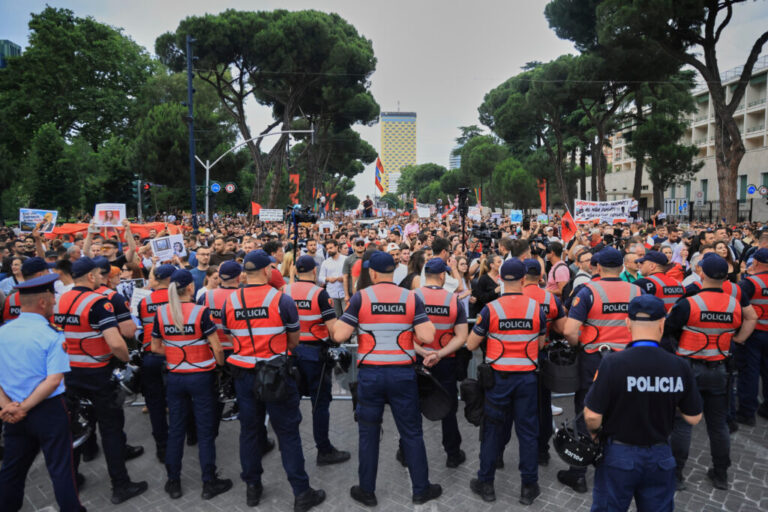 Police officers block a street during a demonstration in Tirana, Albania, Wednesday, June 3, 2026, opposing a luxury coastal development project linked to Jared Kushner and Ivanka Trump over concerns about environmental impacts and transparency.(AP Photo/Hameraldi Agolli)