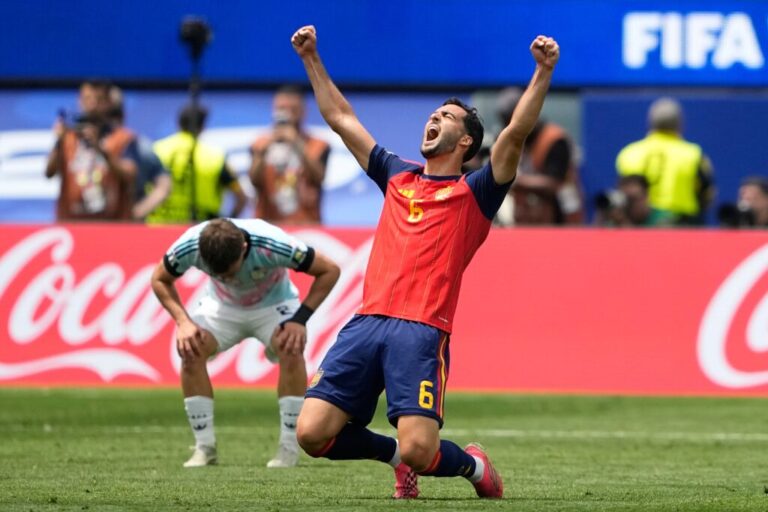Spain's Mikel Merino (6) celebrates after their win in the World Cup quarterfinal soccer match between Spain and Belgium in Inglewood, Calif., near Los Angeles, Friday, July 10, 2026. (AP Photo/Lindsey Wasson)