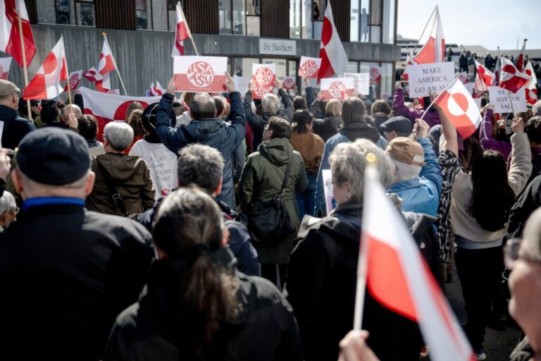 FILE -People turn their backs against the new U.S. consulate, during a protest in Nuuk, Greenland, May 21, 2026. (Oscar Scott Carl/Ritzau Scanpix via AP, File)