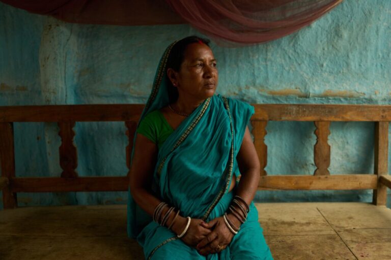 Rajkumari Patel, a community health worker trained to ensure impoverished pregnant women in rural Nepal receive timely prenatal care, poses for a portrait in her home in Gaur, Nepal, on May 20, 2026. (AP Photo/Bram Janssen)
