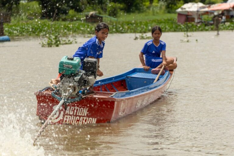 Students from a floating village on Cambodia's Tonle Sap Lake take a school boat back to their homes on Tuesday, June 30, 2026. (AP Photo/Anton L. Delgado)