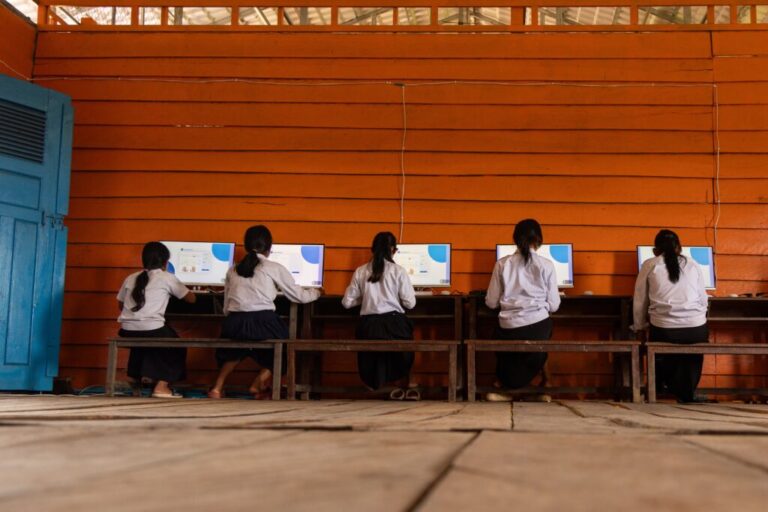 Students attend a computer class at a school in one of the floating villages of Cambodia's Tonle Sap Lake on Monday, June 29, 2026. (AP Photo/Anton L. Delgado)