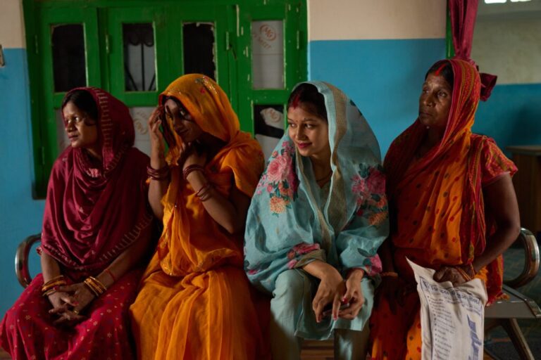 Pregnant women wait for an ultrasound inside a clinic in Gaur, Nepal, on May 20, 2026. (AP Photo/Bram Janssen)