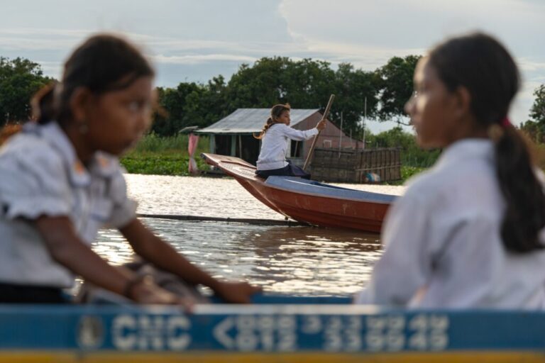 Students board school boats to return to their homes in a floating village on Cambodia's Tonle Sap Lake on Monday, June 29, 2026. (AP Photo/Anton L. Delgado)
