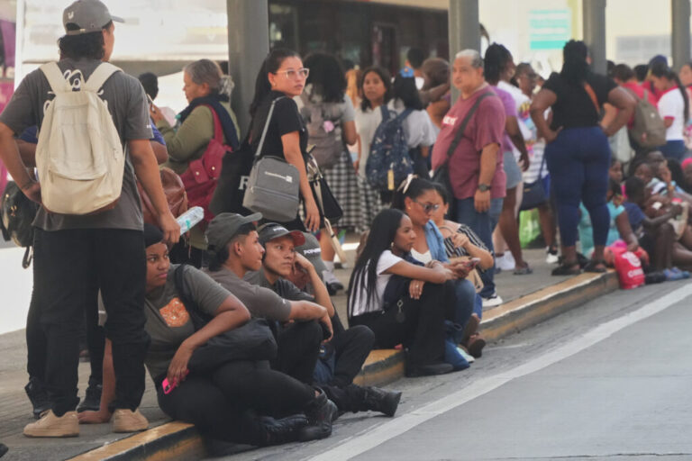 People gather outside shopping mall after an earthquake hit Panama City, Friday, Oct. 9, 2026. (AP Photo/Aris Mariota)